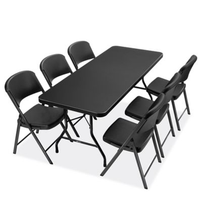 Black fold up store table and chairs