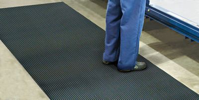 Tapis de passage à nervures ondulées