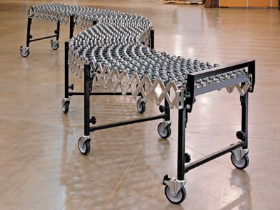 Portable conveyor outlet systems