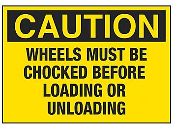 "Wheels Must Be Chocked Before Loading or Unloading" Sign - Vinyl, Adhesive-Backed S-23117V