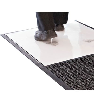 Tapis avec plaque nettoyante