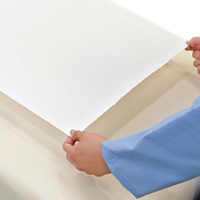 Papier pour table d'examen